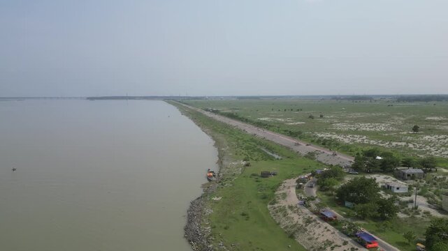Wide drone view of Jamuna River and surrounding landscape Bangladesh 4K