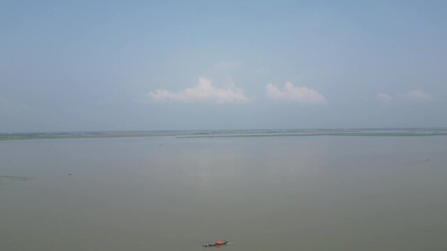 Wide drone view of Jamuna River and surrounding landscape Bangladesh 4K