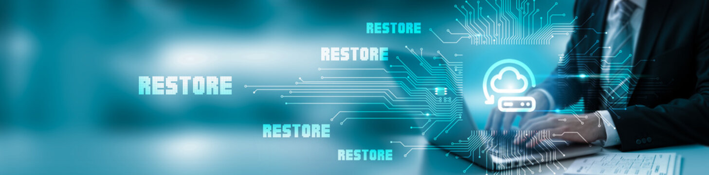 Business professional managing cloud backup and system restore operations through a digital interface, ensuring data recovery, business continuity, and secure cloud infrastructure.