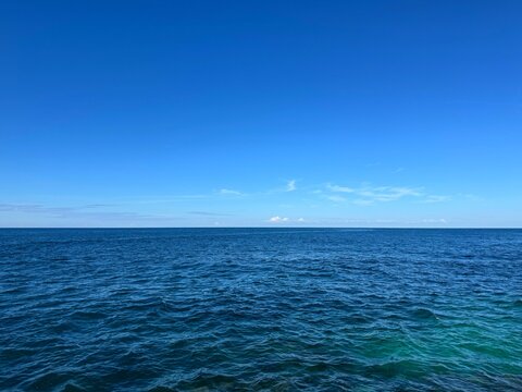Open sea and clear blue sky.