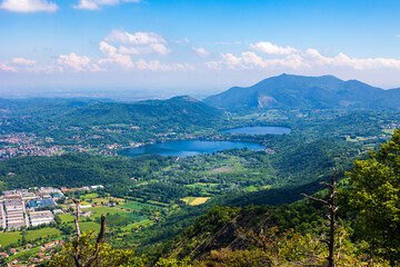 Panoramic view of the Avigliana lakes forming a nature park seen from the top of a hill © Ldgfr Photos