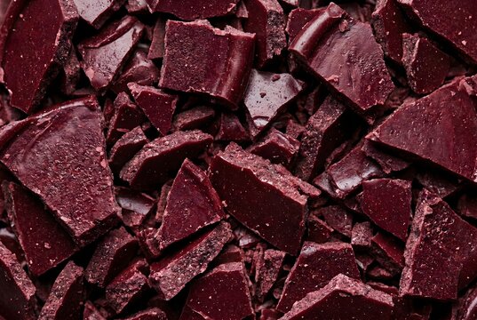 Extreme macro texture of shattered red sealing wax stamp pieces