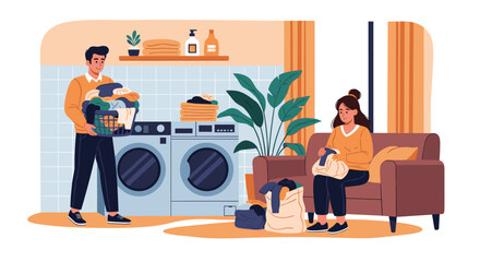 Fototapeta premium Happy young couple doing household chores together by using a washing machine and folding clean clothes in a modern domestic laundry room.