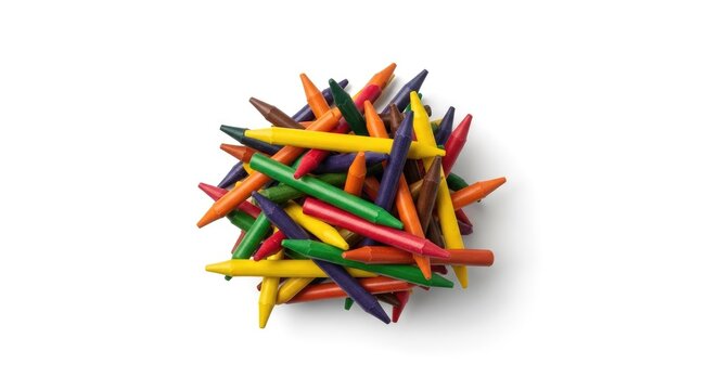 Assorted broken crayons heap isolated on white