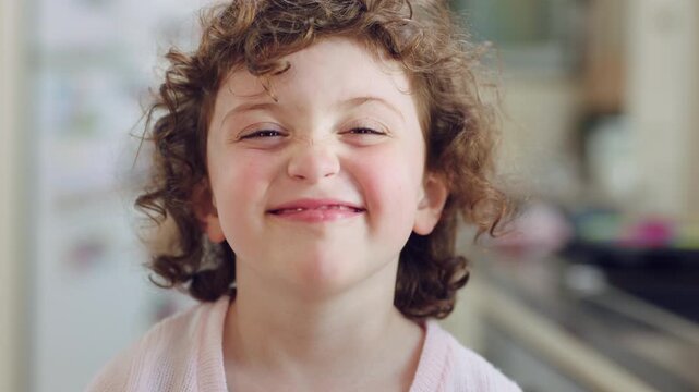 Child, face and relax with smile in home, thinking and girl with imagination on weekend or thoughts. Kid, contemplating and remember good memory on break, portrait and happy with ideas and reflection