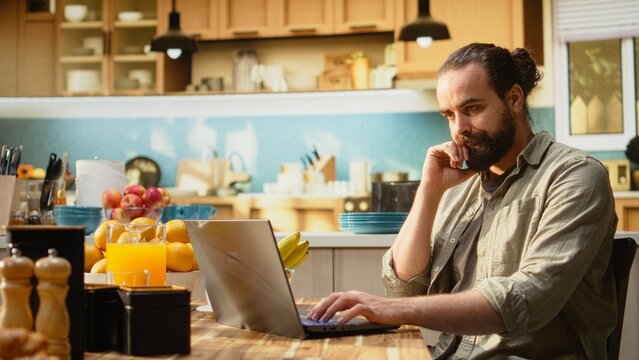 Pensive intellectual man thinking about decision making ideas, pondering and planning the future, Considering problem solving with rational vision and reflection, perspective on remote work.