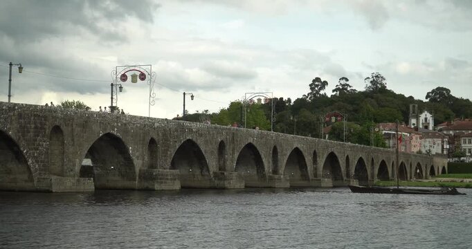 the famous Ponte de Lima (also known as Ponte Romana e Medieval) in the city of the same name in Portugal. It crosses the Lima River and is considered one of the most important landmarks of the Minho 