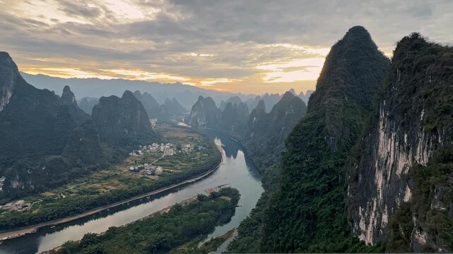 Majestic aerial view of Li River and karst mountains in Yangshuo at sunset