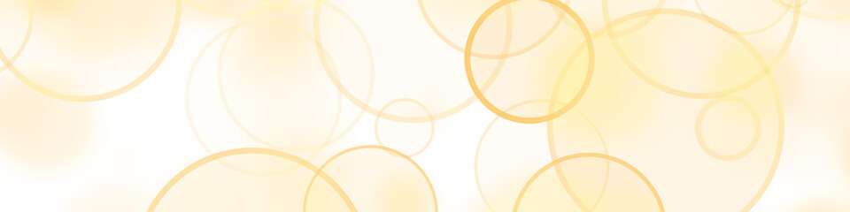 Golden bokeh light rings on transparent background horizontal banner magic glowing circle lens flare particles. © MatStudio