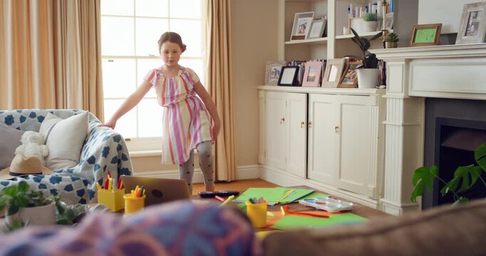 Laptop, ballet and girl in home with e learning, streaming video or tutorial for warm up dance. Dancer, balance and child with online education for stretching, preparation or rehearsal in living room
