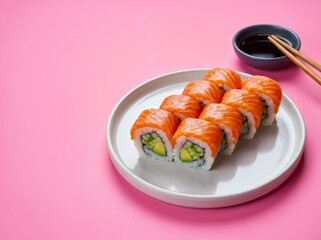Salmon and Avocado Sushi Rolls on a Pink Background © Emad Fathy Hussein A