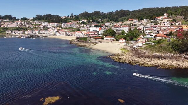 Mussel rafts dotting the waters of ria de pontevedra, a key aquaculture area in galicia