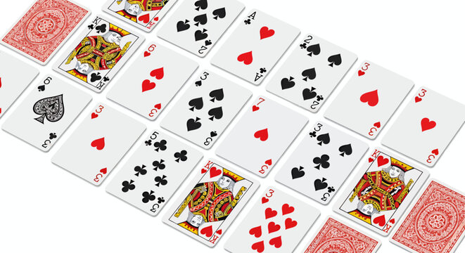 Vibrant spread of playing cards displaying colorful suits and patterns.