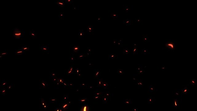 Bright golden fireworks exploding in the night sky creating a stunning display of light and motion for festive holiday celebrations