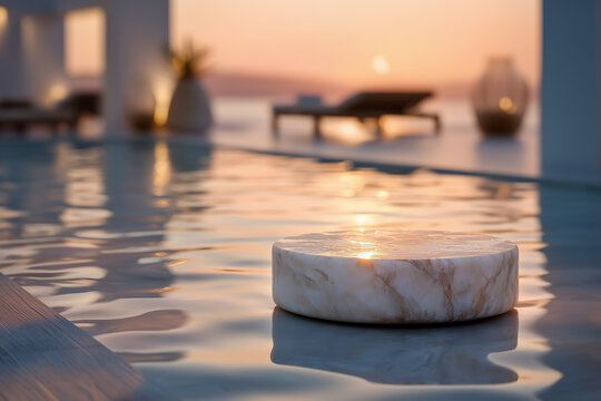 Luxurious marble pedestal floating on luxury resort swimming pool water surface at sunset for cosmetic background