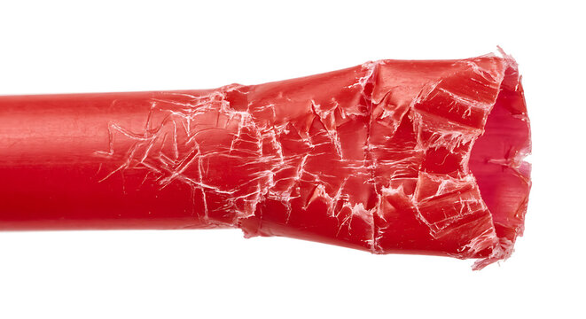 Damaged Red Plastic Pipe with Frayed End Isolated on White Background