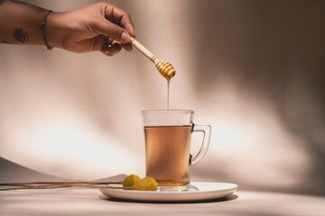 honey commercial photography, golden honey drizzle, premium honey advertising, natural sweetener concept, honey splash visuals, luxury food branding, organic honey product, golden nectar flow, gourmet © mansour