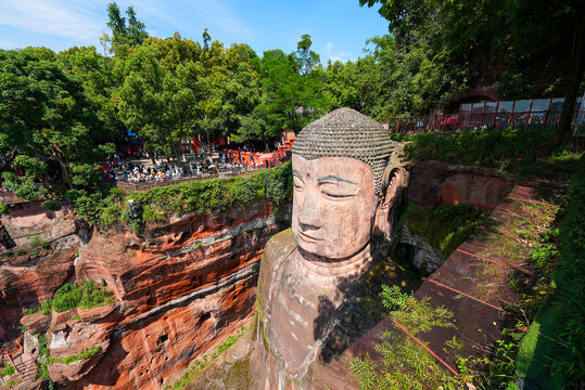The Leshan Giant Buddha, a monumental stone statue carved out of a cliff face in Sichuan, China