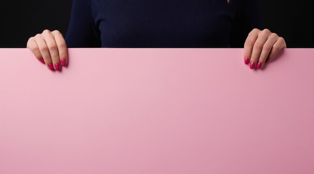Woman holds large pink blank banner. Person displays empty space for message. Graphic for advertising or announcements. Offers choice for text and design.