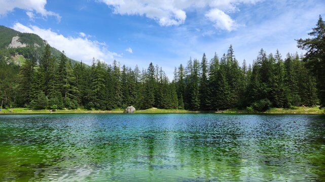 Gr&uuml;ner See Austria with Crystal Clear Water, Mountains and Forest Reflection