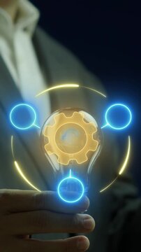 Business Model concept, a strategic plan of how business will generate revenue and reach profitability. Businessman shows glowing neon line of Business Model icon on virtual screen.