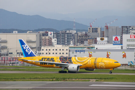 Fukuoka, Japan - July 10, 2019: An ANA All Nippon Airways Boeing 777-200ER (Registration JA743A) in special "C-3PO STAR WARS" livery taxiing at Fukuoka Airport.