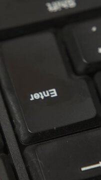 Pressing enter key close up macro shot
