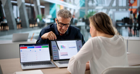 Fototapeta premium Compliance Manager And Team Analyze Risk Data