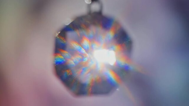 Abstract Crystal Prism Reflecting Light, Creating Moving Rainbow Flares and Ethereal Bokeh Effects