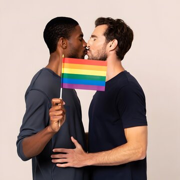 Two Men Kissing with Rainbow Flag Celebrating Love and Equality