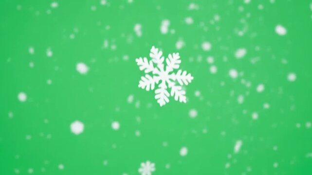 White snowflakes falling gently against a solid green background
