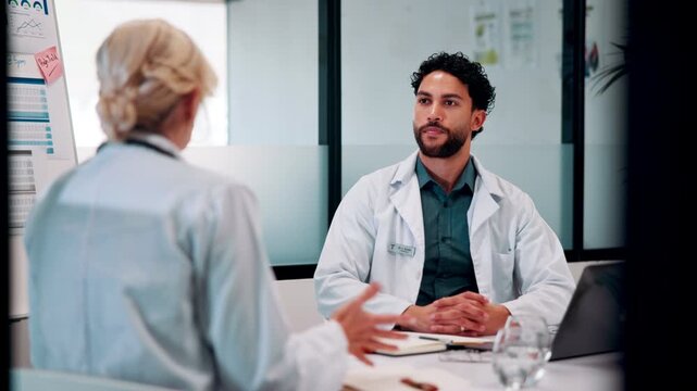 Doctor, team and discussion in hospital with laptop, medical research and stats for mortality rate. Healthcare, people and meeting in clinic with computer, data analysis and graphs for patient care.