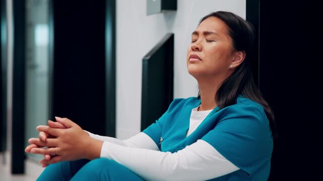 Healthcare, surgeon and woman with fatigue in clinic, overwhelmed and thinking of difficult surgery. Unhappy, doctor and person with guilt after operation mistake, reflection or exhausted in hospital