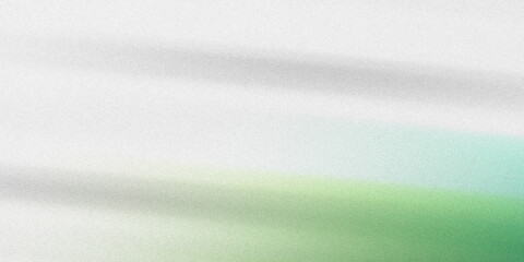 Obraz premium Soft abstract background with gentle diagonal light rays and grainy texture featuring pastel green and off white color hues.