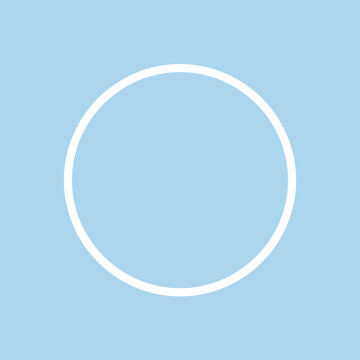 A simple white circle centered on a light blue background surface