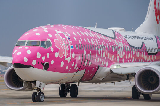 Fukuoka, Japan - February 16, 2019: A Japan Transocean Air (JTA) Boeing 737-800 (Registration JA06RK) in special "Sakura Jinbei Jet" livery taxiing at Fukuoka Airport.