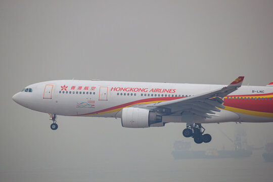 Chek Lap Kok, Hong Kong - January 23, 2018: A Hong Kong Airlines Airbus A330-300 (Registration B-LNC) on final landing approach to Hong Kong International Airport.