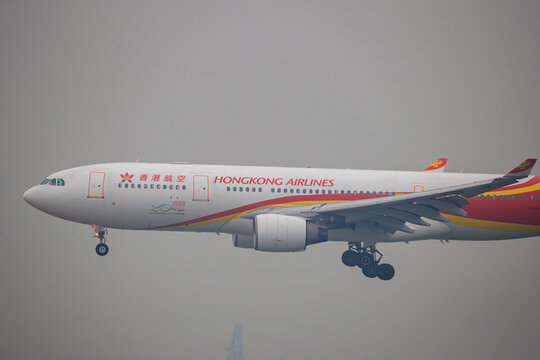 Chek Lap Kok, Hong Kong - January 23, 2018: A Hong Kong Airlines Airbus A330-300 (Registration B-LNC) on final landing approach to Hong Kong International Airport.