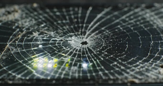 Shattered Glass with Radial Cracks and Damage.