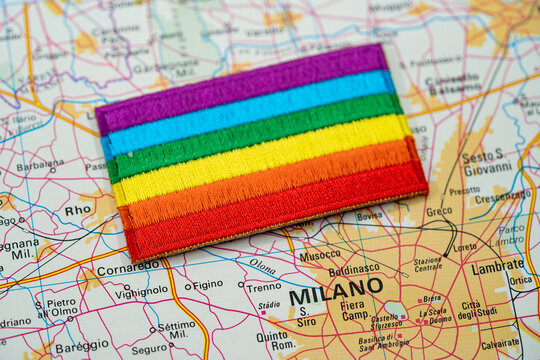 Close up of Milan map with rainbow pride flag.