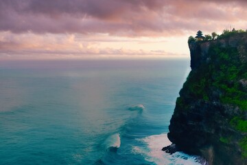      Bali, Indonesia - June 7, 2022: The Uluwatu Temple on a Cliff. Perched dramatically on a steep cliff, Uluwatu Temple stands at an elevation of 97 meters above sea level, offering breathtaking oce © Scotts Travel Photos