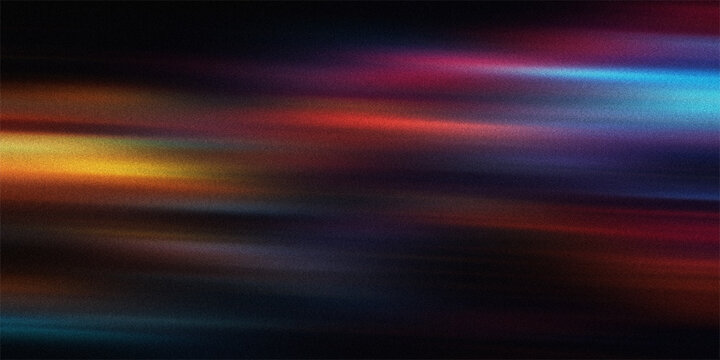 Abstract dynamic light streaks with grainy texture featuring glowing red blue and yellow lines moving across dark backdrop.