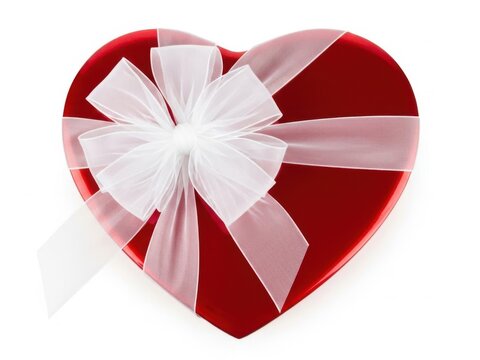 Heart-shaped gift box with white bow isolated on white background