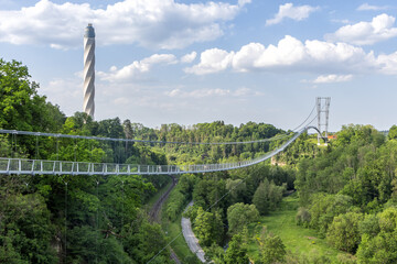 Naklejka na ściany i meble Suspension bridge Neckarline over Neckar river and TK Elevator Test Tower in Rottweil, Germany