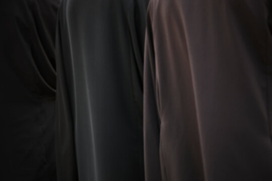 Clergy in black religious vestments