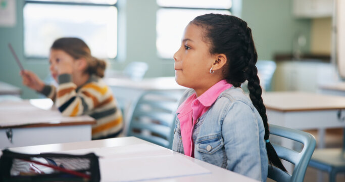 Child, learning and lesson in classroom, education and listening to teacher for academic development. Elementary school, students and kids with cognitive growth, knowledge and assessment explanation