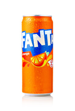 Fanta orange soda can with condensation on white background