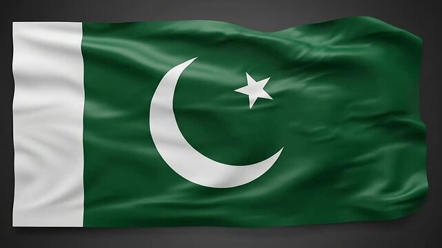 A green flag with a white crescent moon and a star waving in the wind