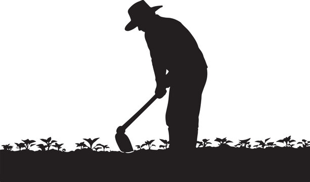 Man in hat digging with shovel in garden with plants