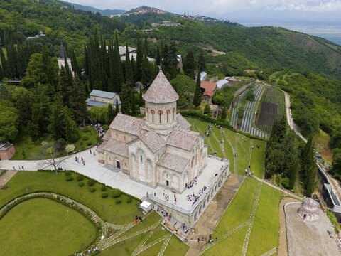 Church surrounded by gardens and hills in a peaceful landscape, aerial view, Bodbe Monastery, Sighnaghi, Signagi, Kakheti Province, Greater Caucasus, Georgia, Near East